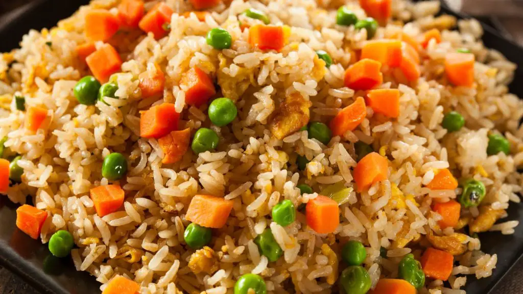 Guayanese fried rice with carrots and peas