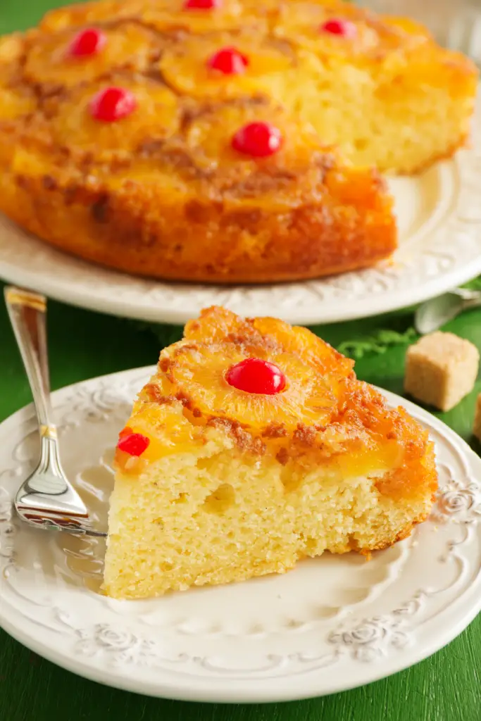 Sliced portuguese pineapple upside-down cake with cherries